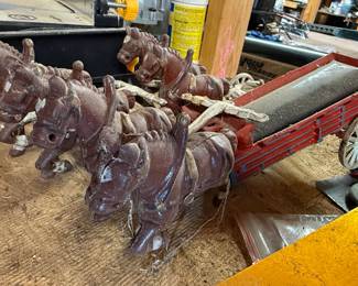 Vintage cast iron horse drawn wagon