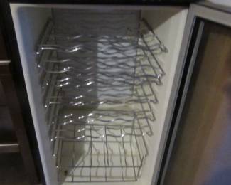 Inside look at working wine chiller.