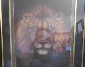 Large print of a lion, professionally framed. Large print.