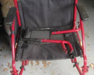 Push chair with leg rest.