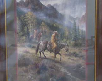 Super nice cowboy's riding horses print, large print. Located in master bedroom.