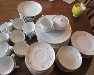 Starter set of dishes, located in formal dining room.