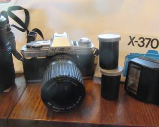 Minolta X370 FILM camera with flash and extra lens.
