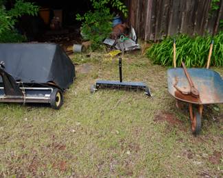 wheel barrow, yard sweep