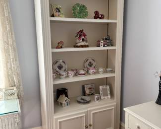 Pair of custom lighted bookshelf cabinets
