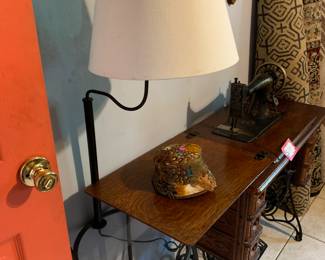 1901-1905 singer sewing machine and table, literal table lamp, rugs