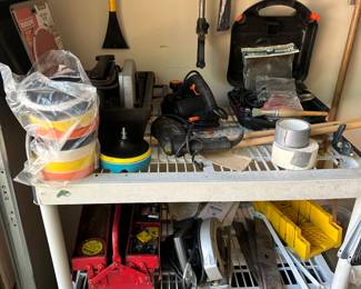 Misc tools, mouse sander, circular saw and buffing pads and a cantilever old school tool box