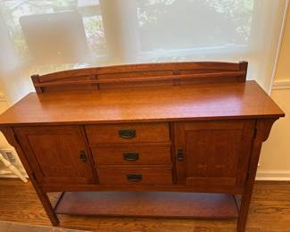 Beautiful Basset Furniture Sideboard. Two side doors have shelves with three central drawers