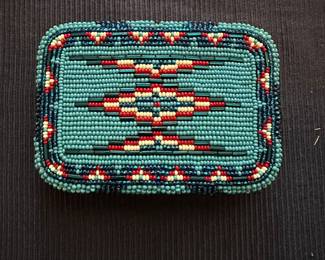 Beaded belt buckle