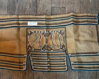 Traditional leader skirt from South Africa. Made of burlap and hand beaded.