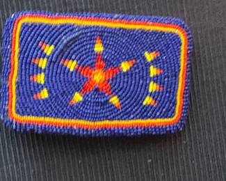 Beaded belt buckle