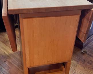 This a an additional butcher block table or island. This one comes equipped with storage drawers !