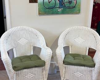 Resin Wicker in home or patio (waterproof) chairs. Like new !!