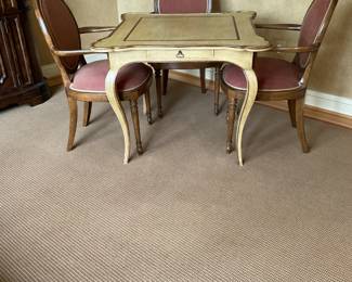 Minton-Spidell French game table with Italian ochre finish 36” x 36” x 29” H. Chairs are Minton- Spidell Bristo Arm Chairs - Dark Ramshead finish. Fabric Schumacher - Waldon Chenille Sunset
