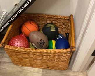 Basket of various sports balls