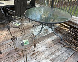 Round Glass top Table 
Metal plant stands