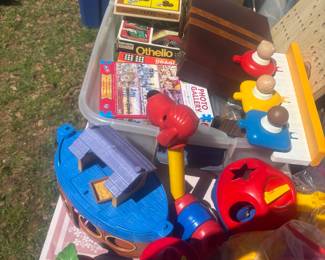 Tupperware toys, games and fisher price items
