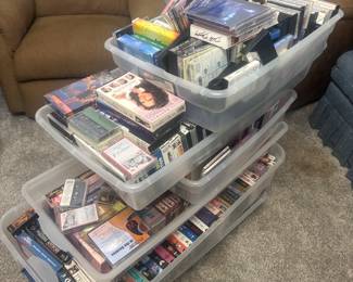 Lots of DVDs, CDs, VHS. These will be displayed on a table at sale
