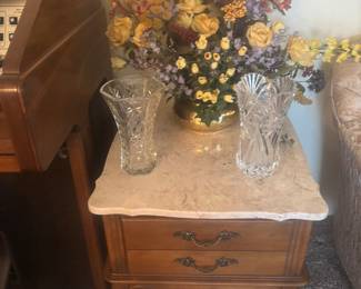 Vintage marble top end table, crystal vases and brass flower arrangement