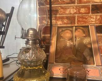 Hurricane lamp, kidding dolls and liberty bell bank