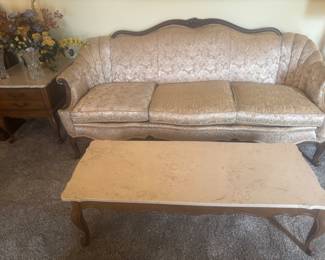 Vintage couch and marble top coffee table. Excellent condition