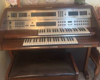 Baldwin Microcomputer Orchestra organ with stool and sheetmusic