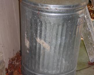 1 of 2 galvanized trash cans