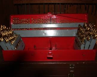 125 brass bits in metal case