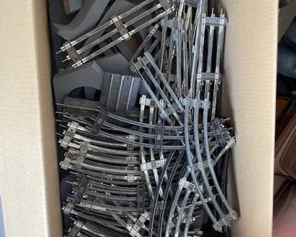 miniature train track pieces