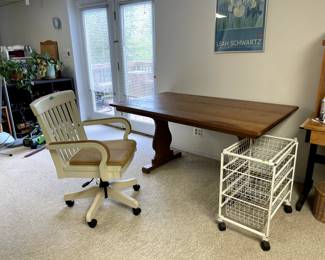 trestle table, old style office chair, storage, futon, sofa, baskets, storage, book cases, books, universal gym, etc.