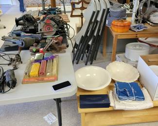small power tools in basement, set of samsonite folding chairs, pottery, sets of dishware,