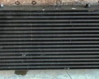 91 - Intercooler - 32" x 13" You are buying a used as-is item. We do not guarantee all components are present, and if it is not expressly stated, it is untested.
