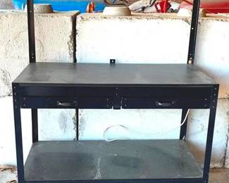 144 - Metal Work Table with Power - 48" x 24" x 63" You are buying a used as-is electric/electronic item. We do not guarantee all components are present, and if it is not expressly stated, it is untested.

