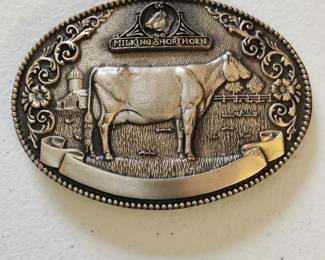 BELT BUCKLES, COWBOY HATS AND BOOTS