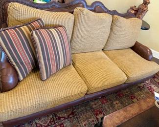 Beautiful leather, hobb nail and fabric couch from Swans