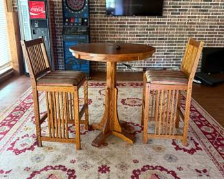 Pub tables with  2 chairs, rugs