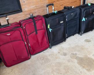 Lots of luggage some with wheels all in great shape ready to go