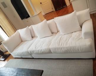 Elegant white sectional sofa consists of 4 pieces and can be configured in an L-shape. Made in USA by Jonathan Louis Inc., Gardena CA (two sections shown here)