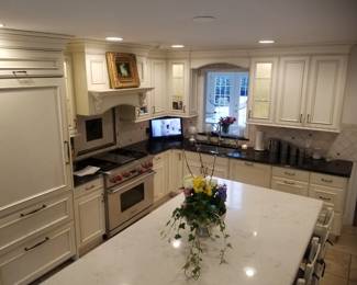 Select cabinets have glass fronts and interior lights