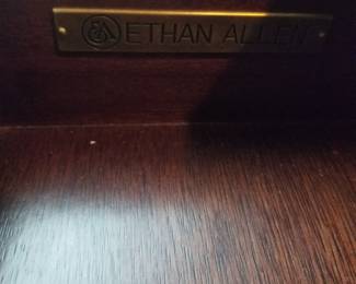 Round leather top table by Ethan Allen