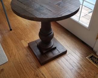 Salvaged wood pedestal table