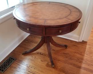 Round leather top table by Ethan Allen