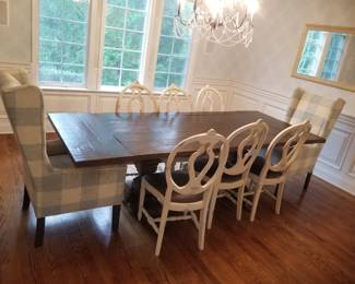 Dining room table seats 8. Shown fully extended with leaves out - table is 9 feet long x 39 inches wide. With leaves in, table is 6 feet long