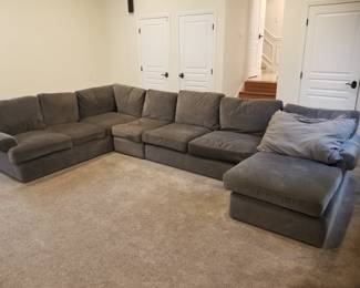 Fabulous gray sectional sofa by Bassett can be configured multiple ways