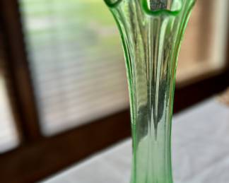 Green depression glass vase.