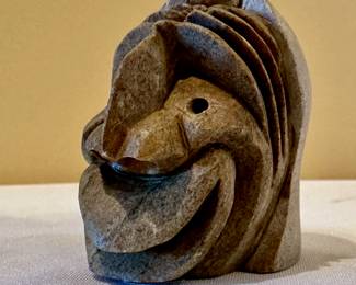 Iroquois carved stone face, signed Aaron Thomas.