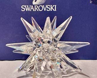 Swarovski crystal star candle holder with original box.