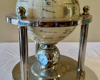 Mother of Pearl rotating globe with clock.