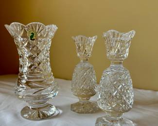 Waterford Crystal Clara vase and a pair of Waterford Pineapple candlestick holders.