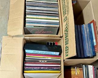 Boxes and boxes of vinyl record albums (and one set of vintage Star Wars laser discs). More boxes of vinyl albums not pictured.